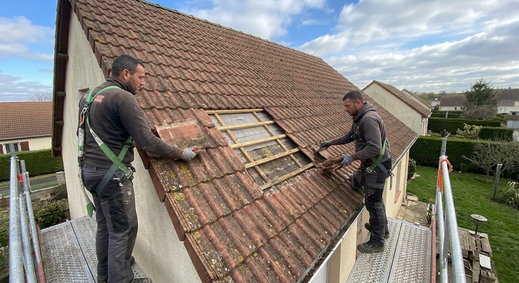 Velux terminé sur une toiture en tuiles